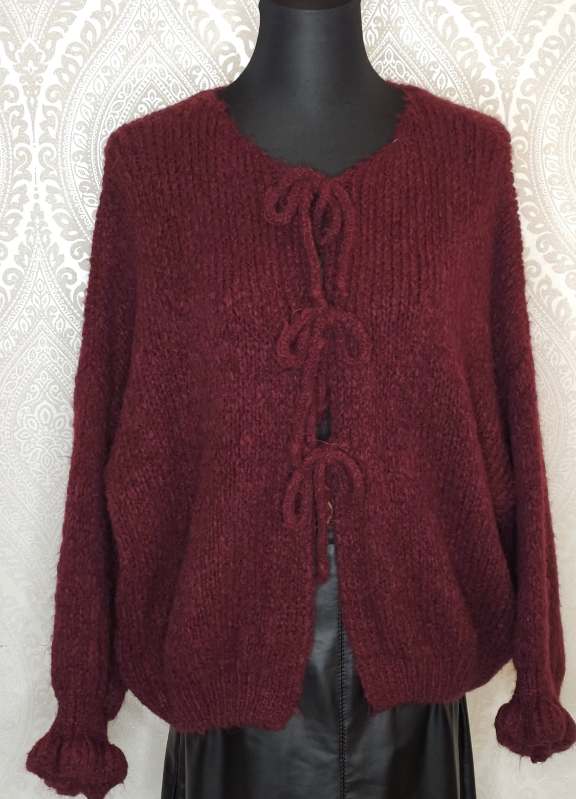 Schleifen Strickjacke