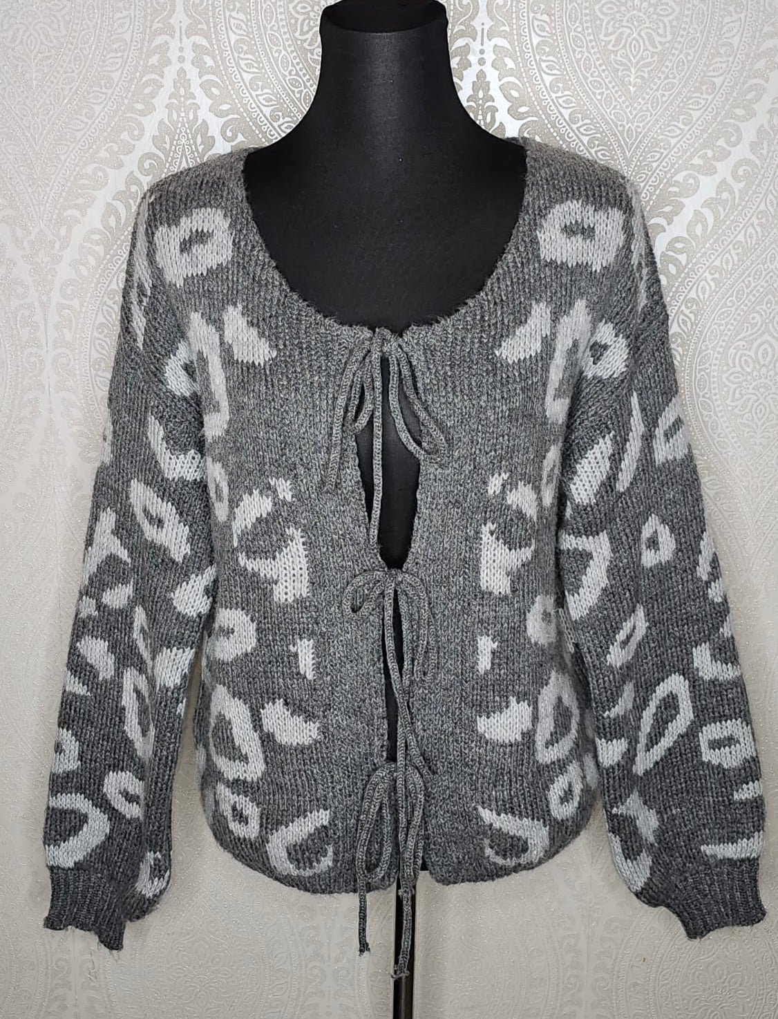 Band Strickjacke